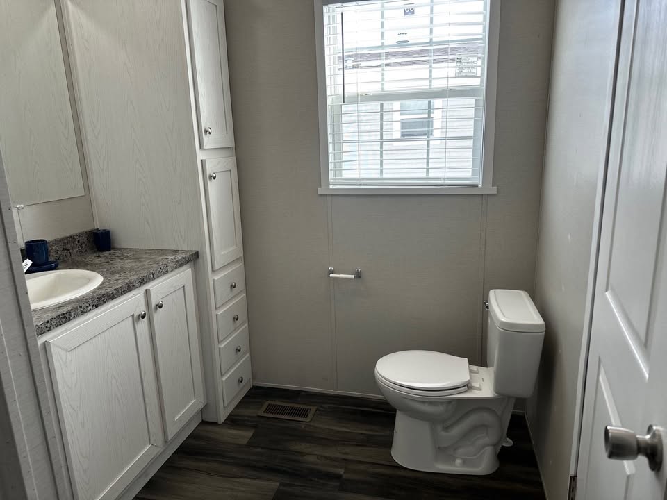 A photo of the The Woodlands Home